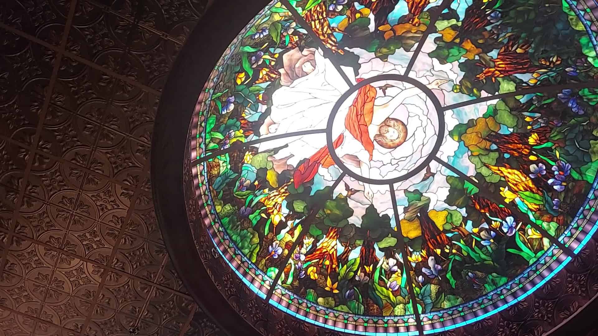 Colorful round rose stained glass window at the Gelman Stained Glass Museum