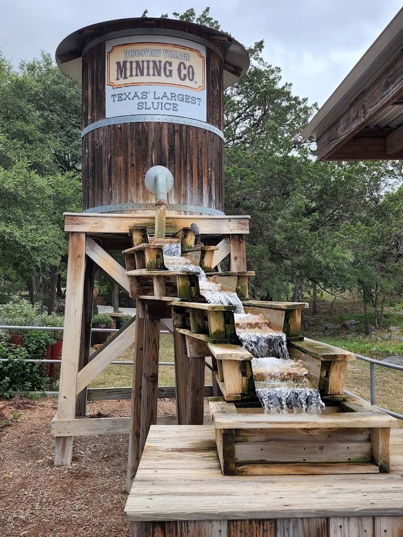 Wooden gem and fossil panning sluice at Natural Bridge Caverns