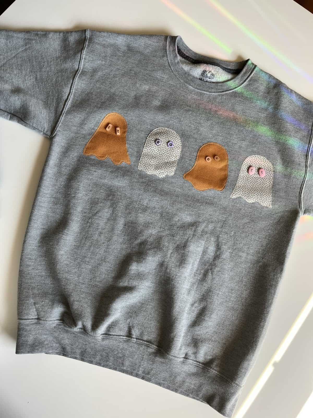 Ghost applique sweatshirt made with materials from Pegasus Creative Reuse in Dallas