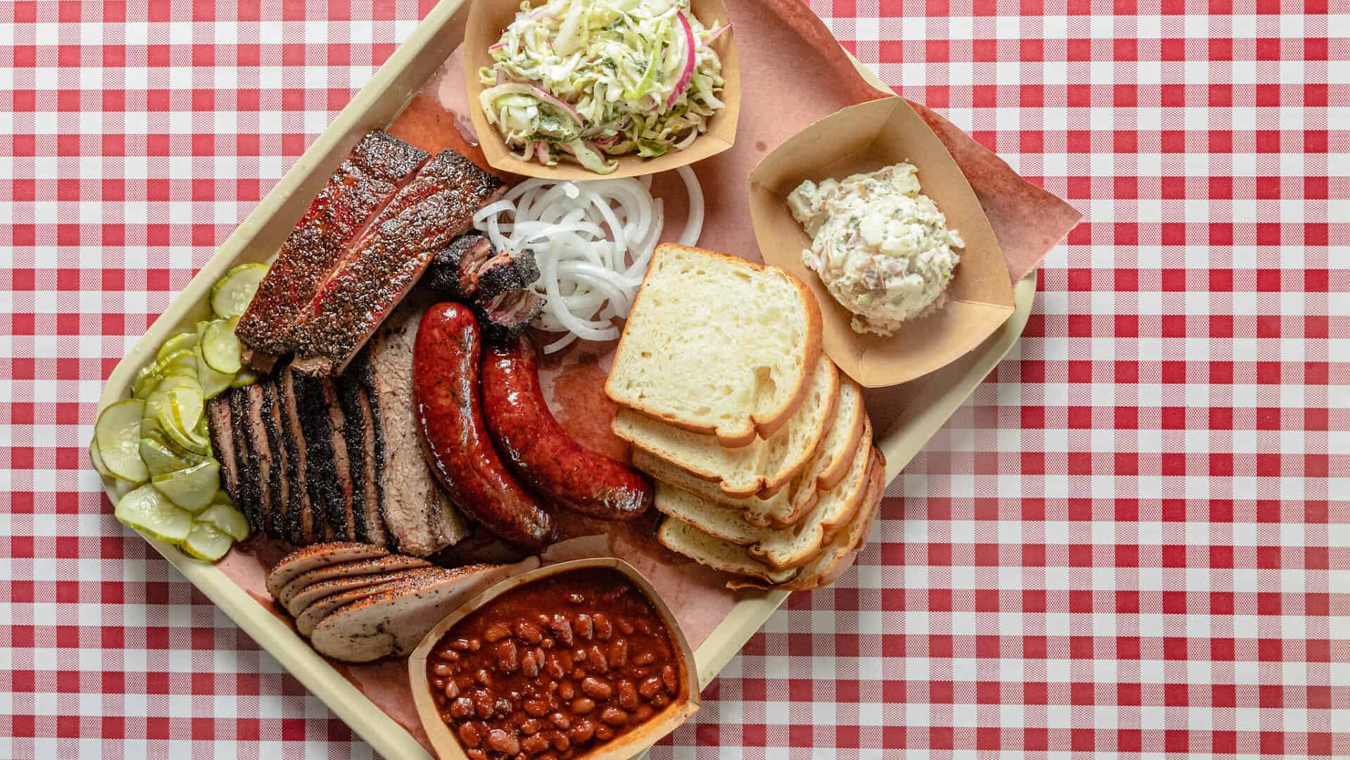 Brisket, sausage and pork ribs on a tray at Goldee's Bar-B-Q in Fort Worth, Texas