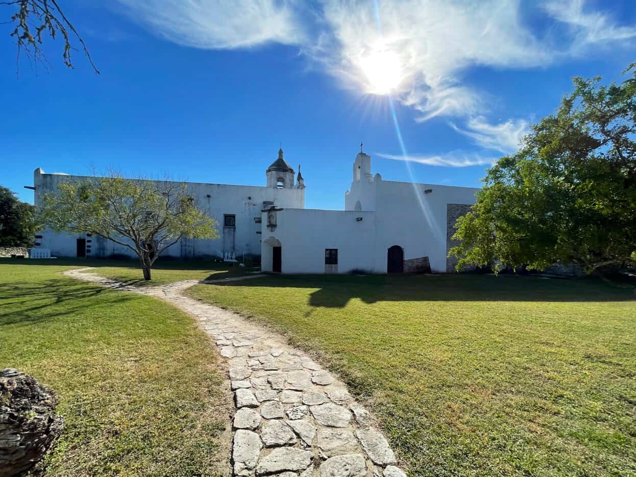 Mission Espiritu Santo and stone walkway at Goliad State Park, Texas