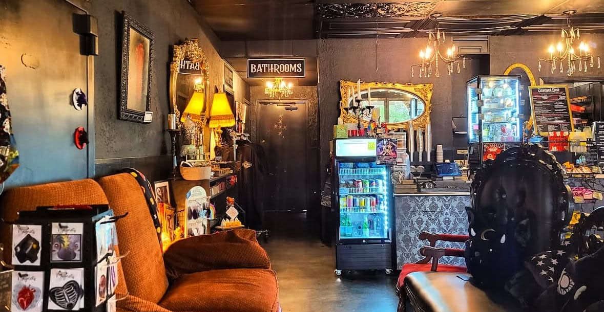 Cozy gothic lounge seating area at Triple Six Social coffee shop in San Marcos