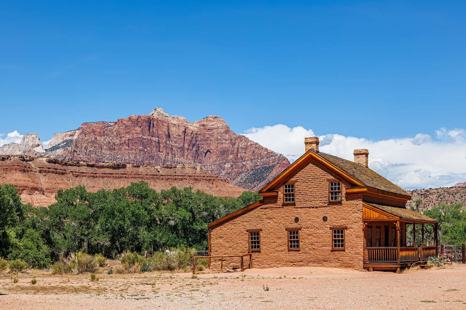 Historic brick house at Grafton ghost town below Zion cliffs, Utah