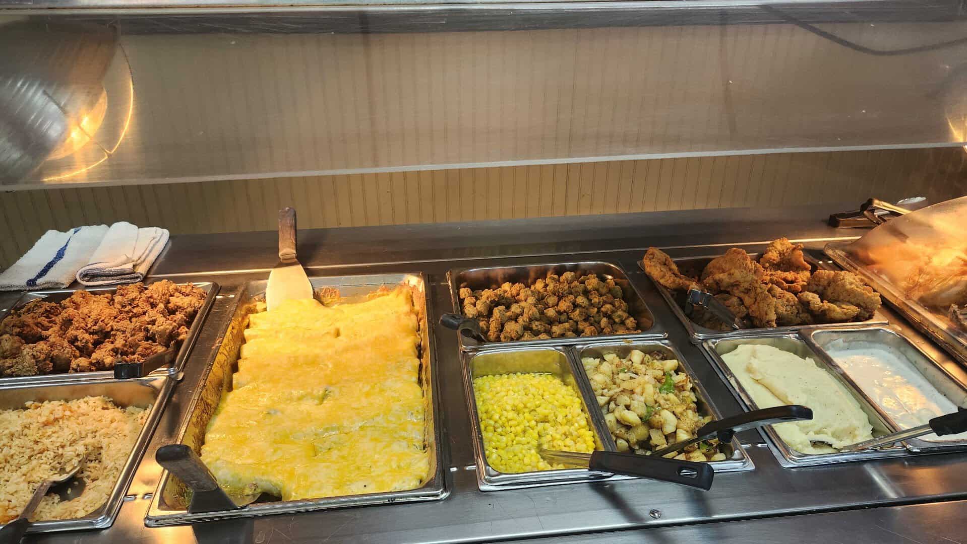 Steam trays of Southern food on the buffet line at Granny Clark's in Dublin, Texas