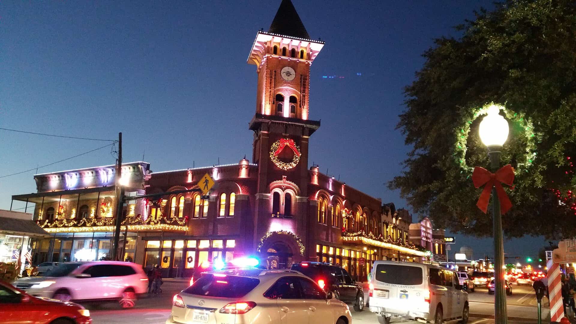 Historic Main Street decorated for Christmas at night in Grapevine, Texas
