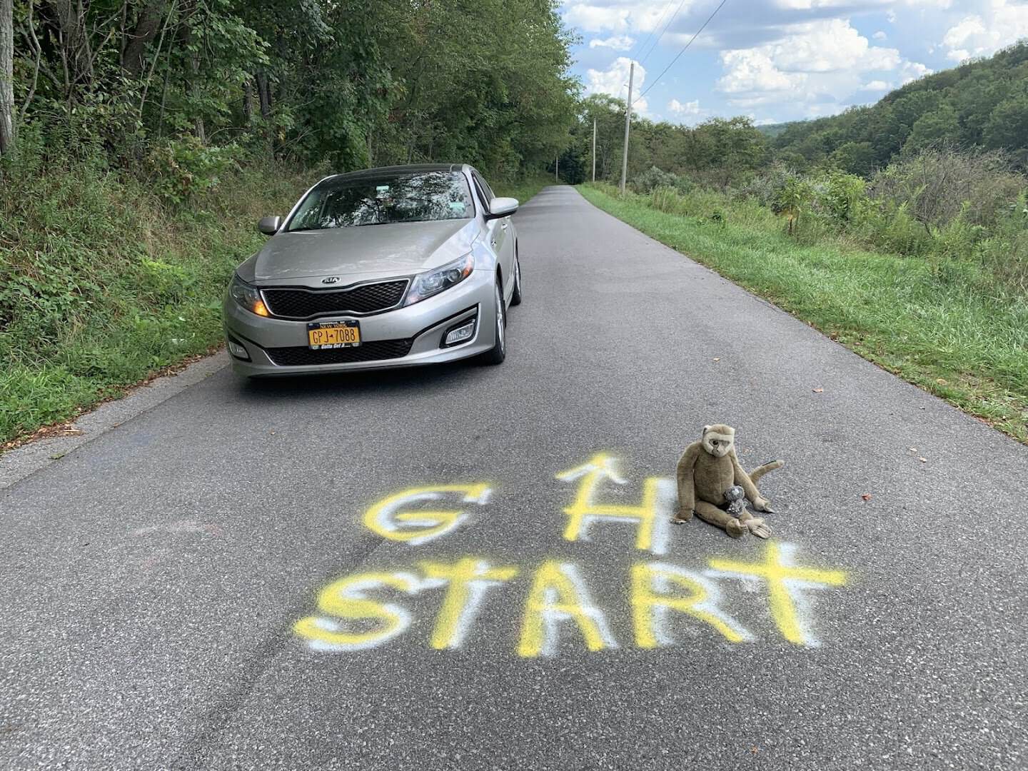 Car at the painted start line on Gravity Hill near New Paris, Pennsylvania