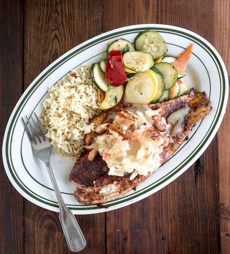 Grilled Gulf seafood plate with vegetables at Topwater Grill in San Leon