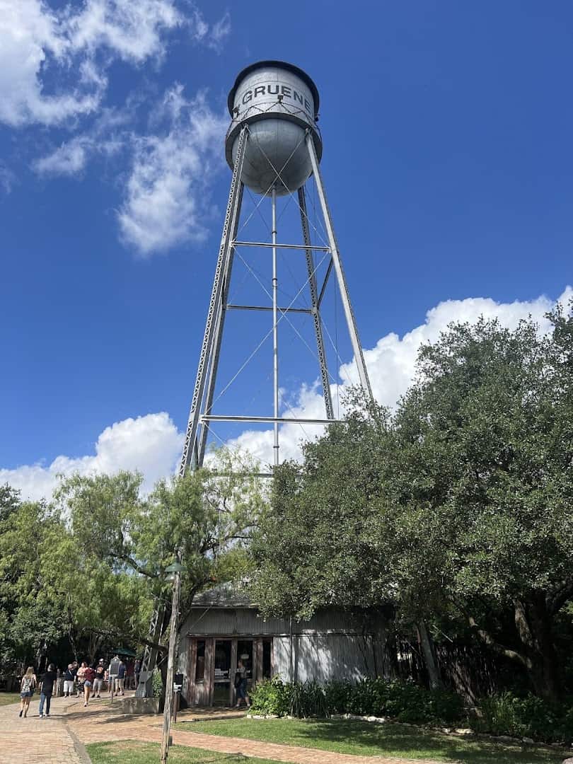 The landmark Gruene water tower rising above the trees in Texas