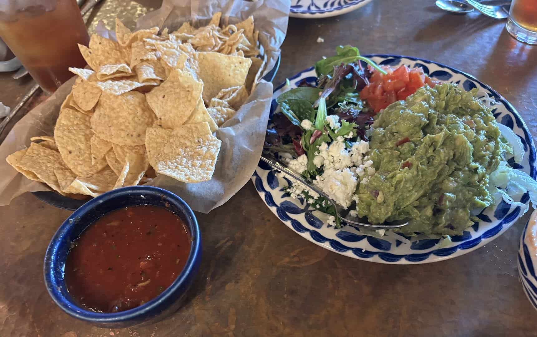 Fresh guacamole with tortilla chips and salsa at Mi Familia at the Rim in San Antonio