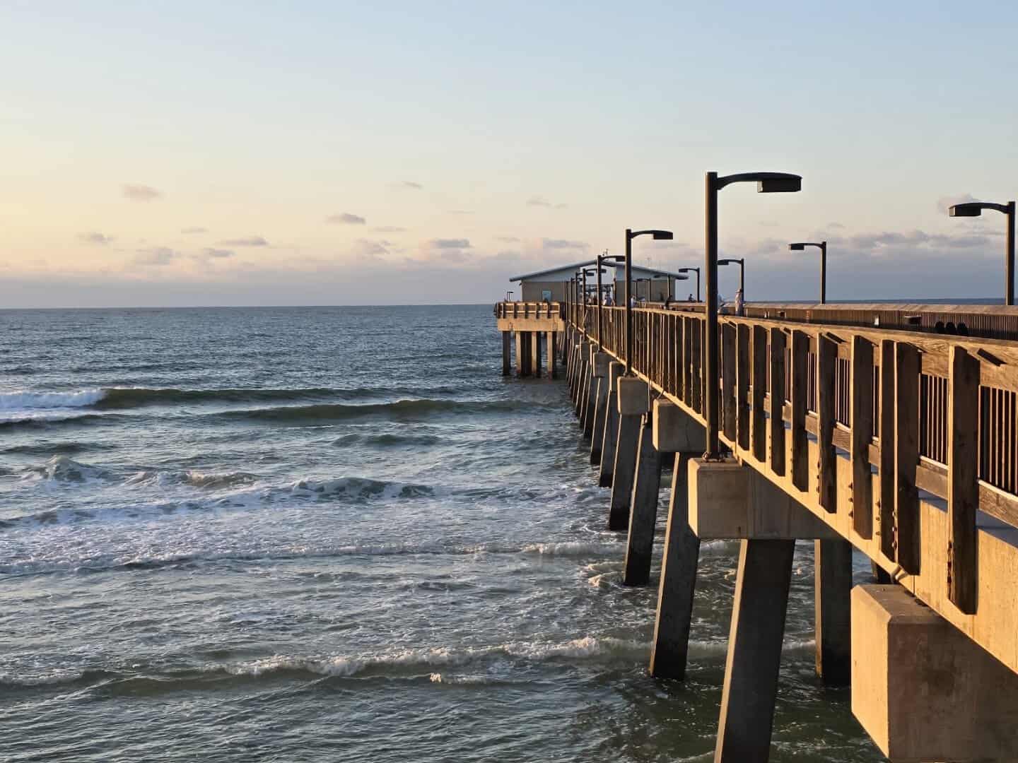 Gulf State Park Pier stretching over the water at Gulf Shores, Alabama