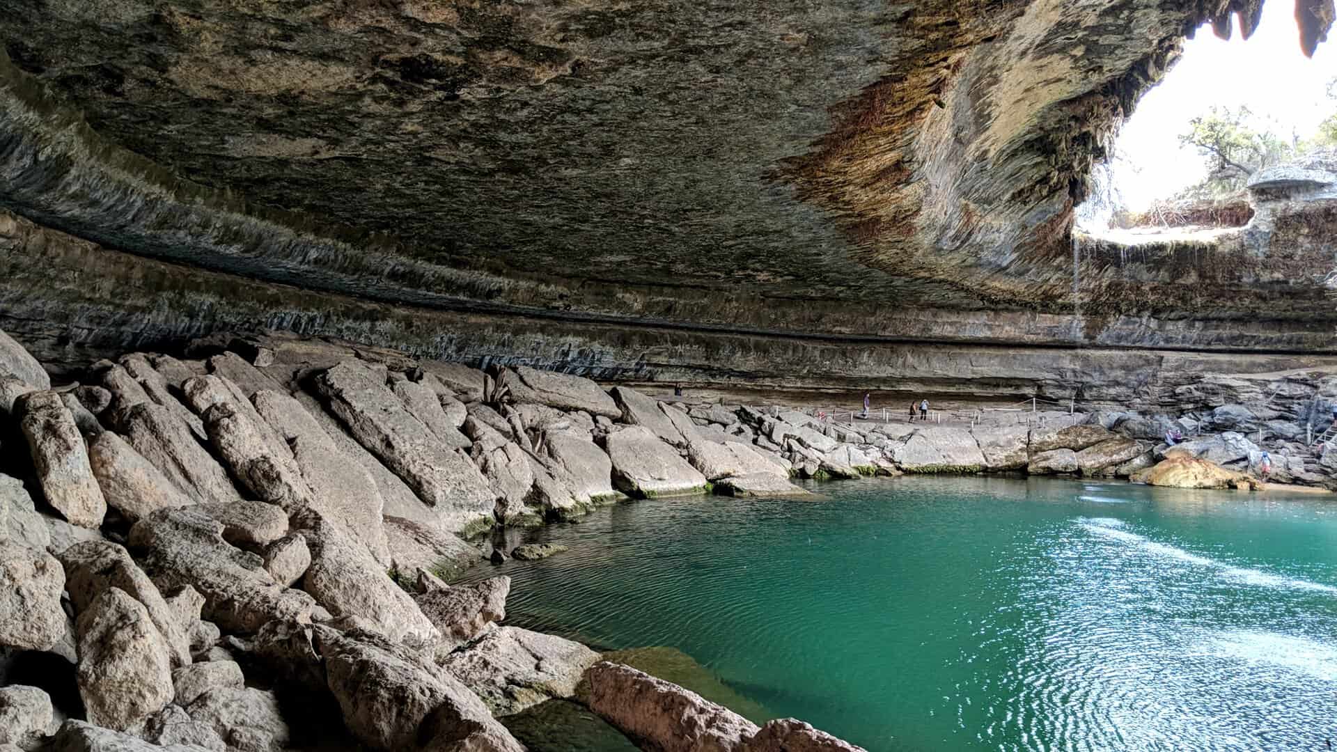 The jade-green pool beneath the limestone grotto at Hamilton Pool Preserve near Dripping Springs, Texas