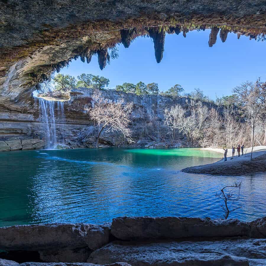 The collapsed limestone grotto and jade pool at Hamilton Pool Preserve near Dripping Springs, Texas