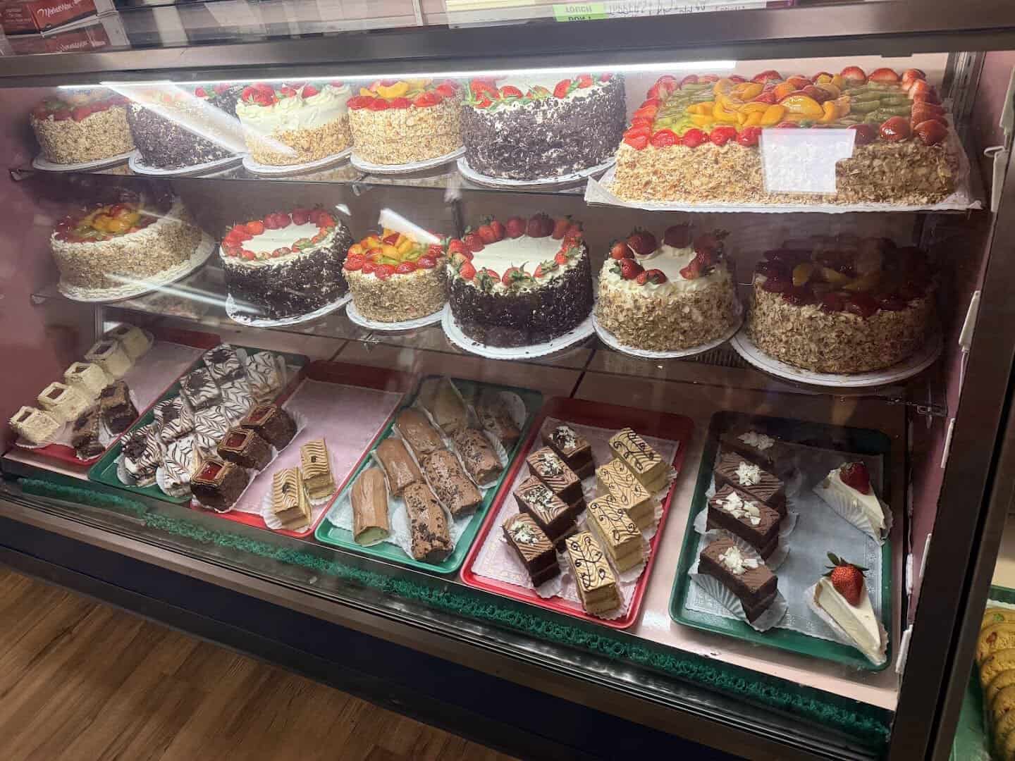 Case of European cakes and desserts at Henk's Black Forest Bakery in Dallas