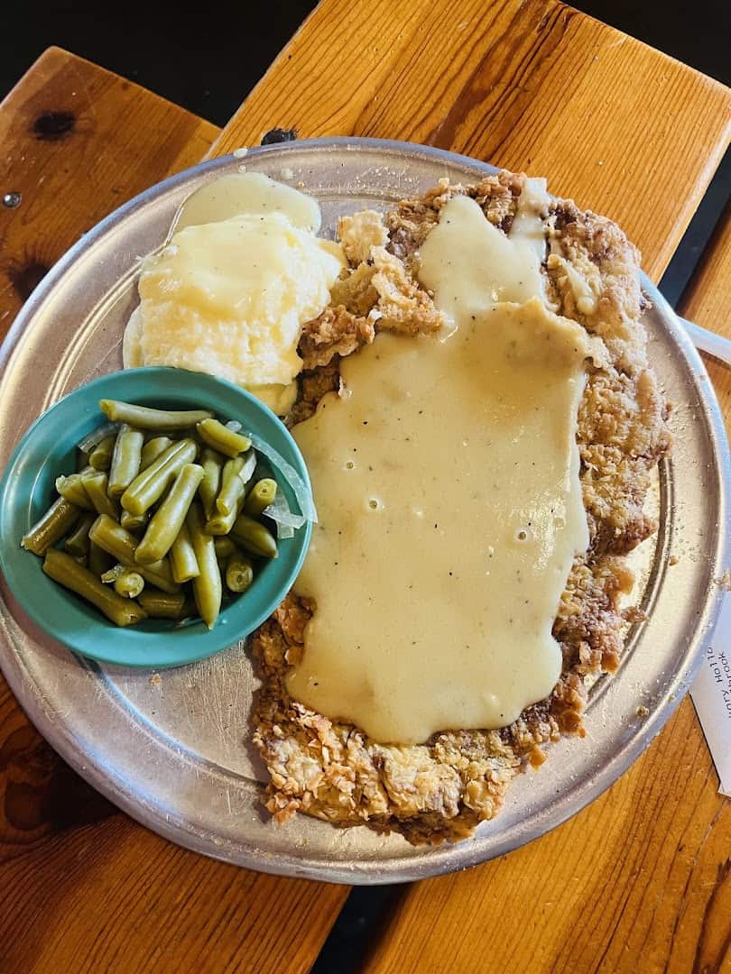 Chicken fried steak with cream gravy at Hickory Hollow in Houston, Texas