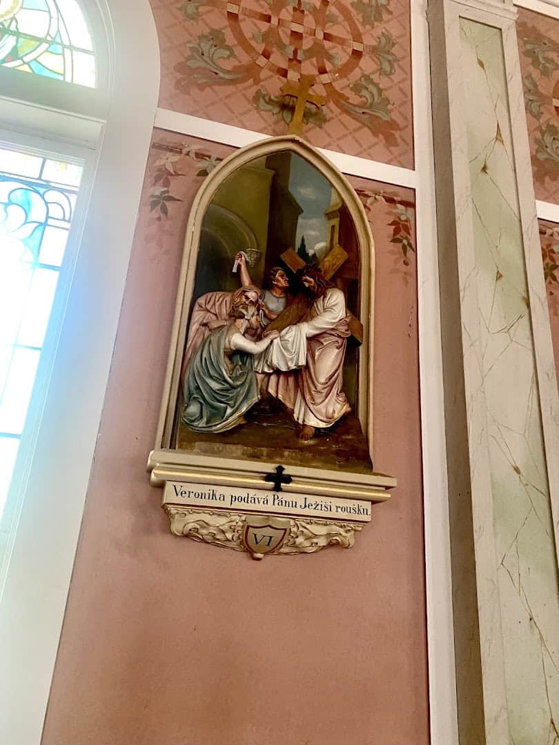 Station of the Cross set in a painted faux-marble niche in the High Hill church