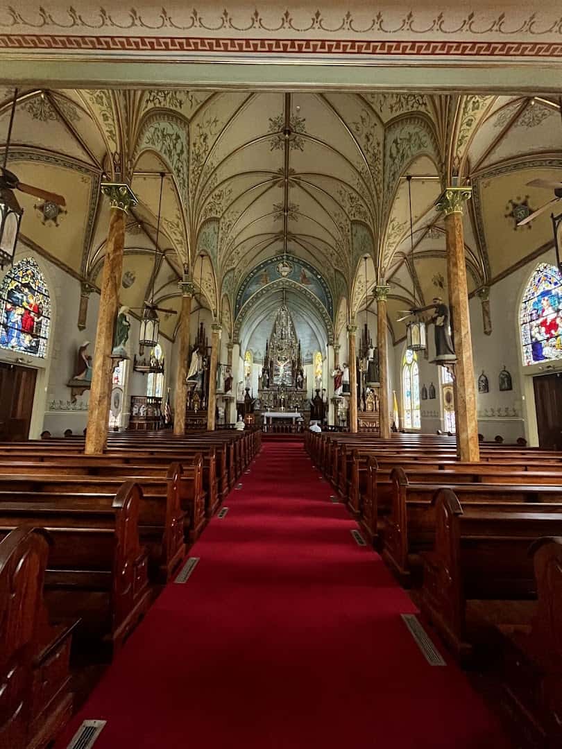 Faux-marble columns lining the aisle of St. Mary's Catholic Church in High Hill, Texas