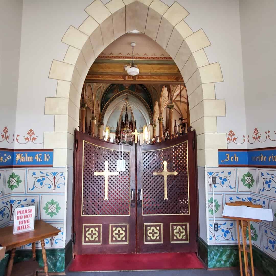Hand-painted vestibule and lattice doors at St. Mary's Catholic Church in High Hill, Texas