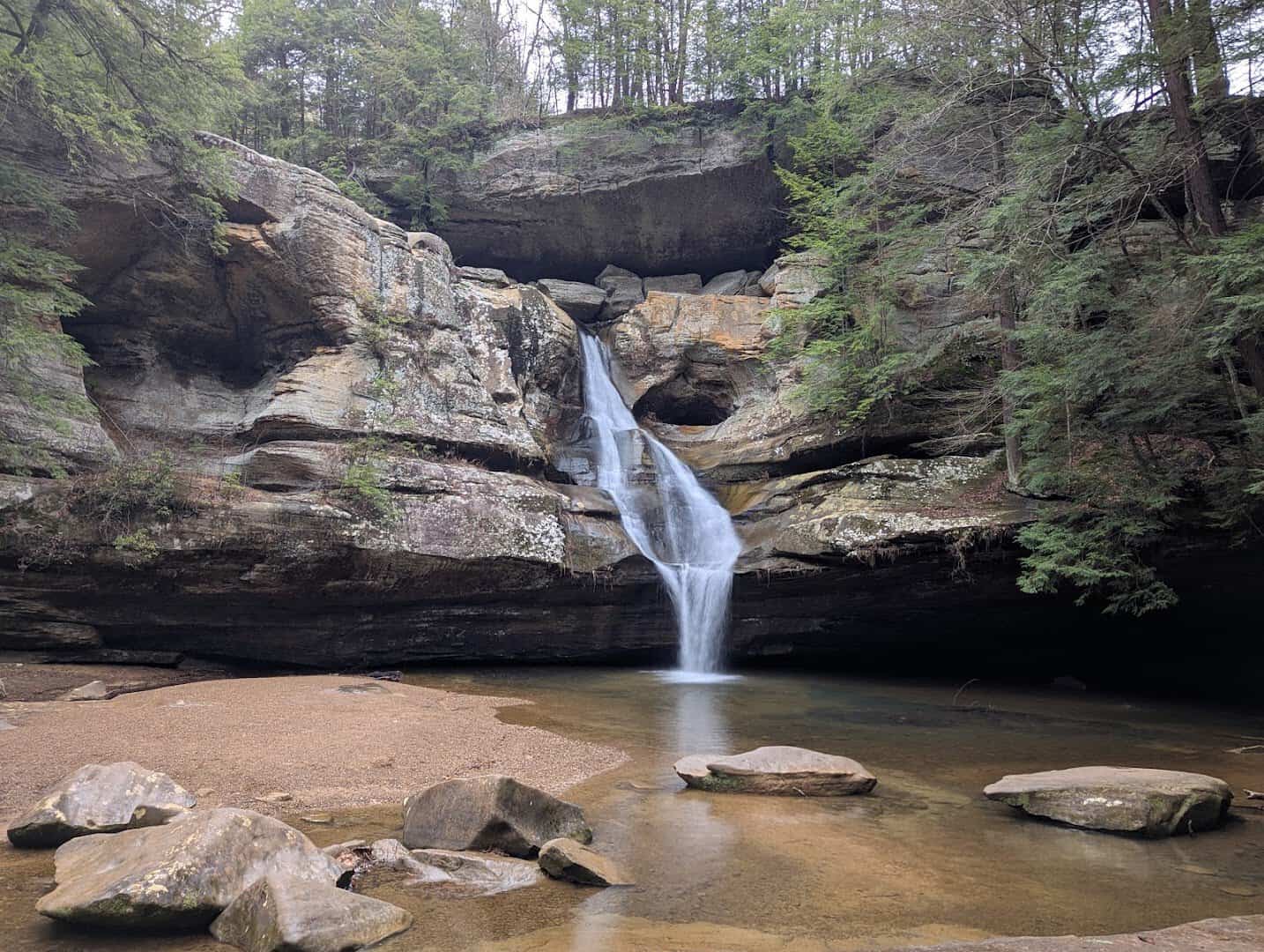 A waterfall tumbling over sandstone at Hocking Hills State Park, Ohio