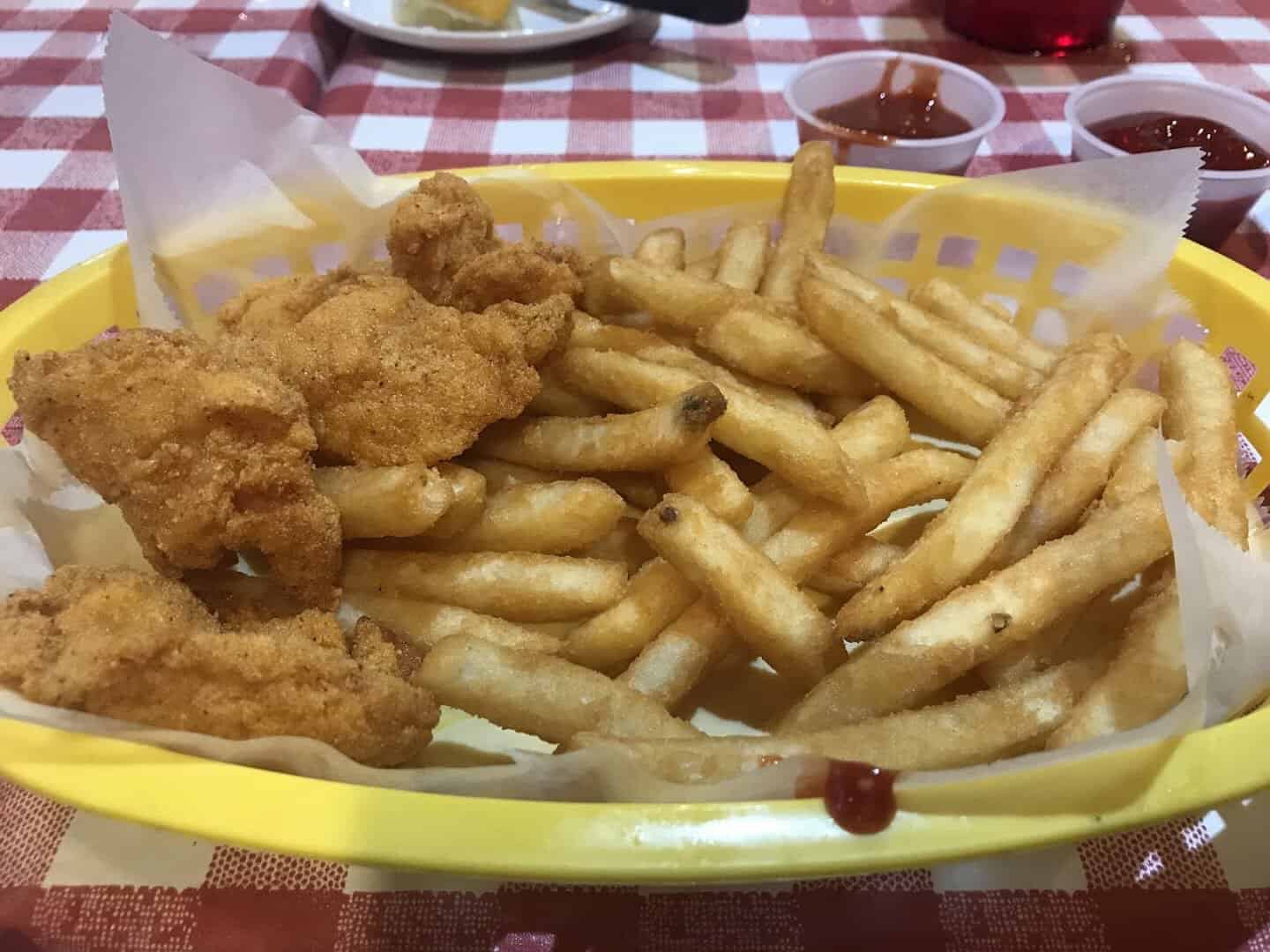 Basket of fried strips and french fries at Hofbrau Steaks in Porter, Texas