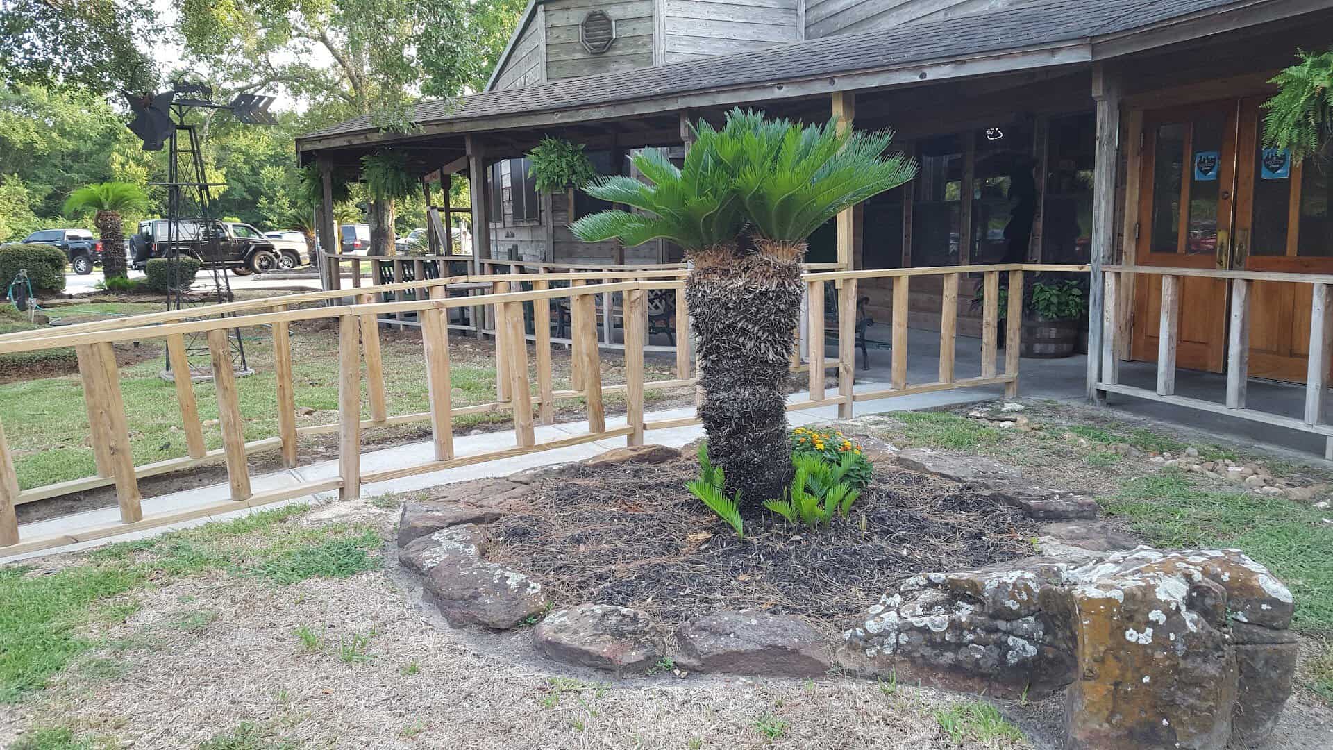 Covered outdoor patio seating at Hofbrau Steaks in Porter, Texas