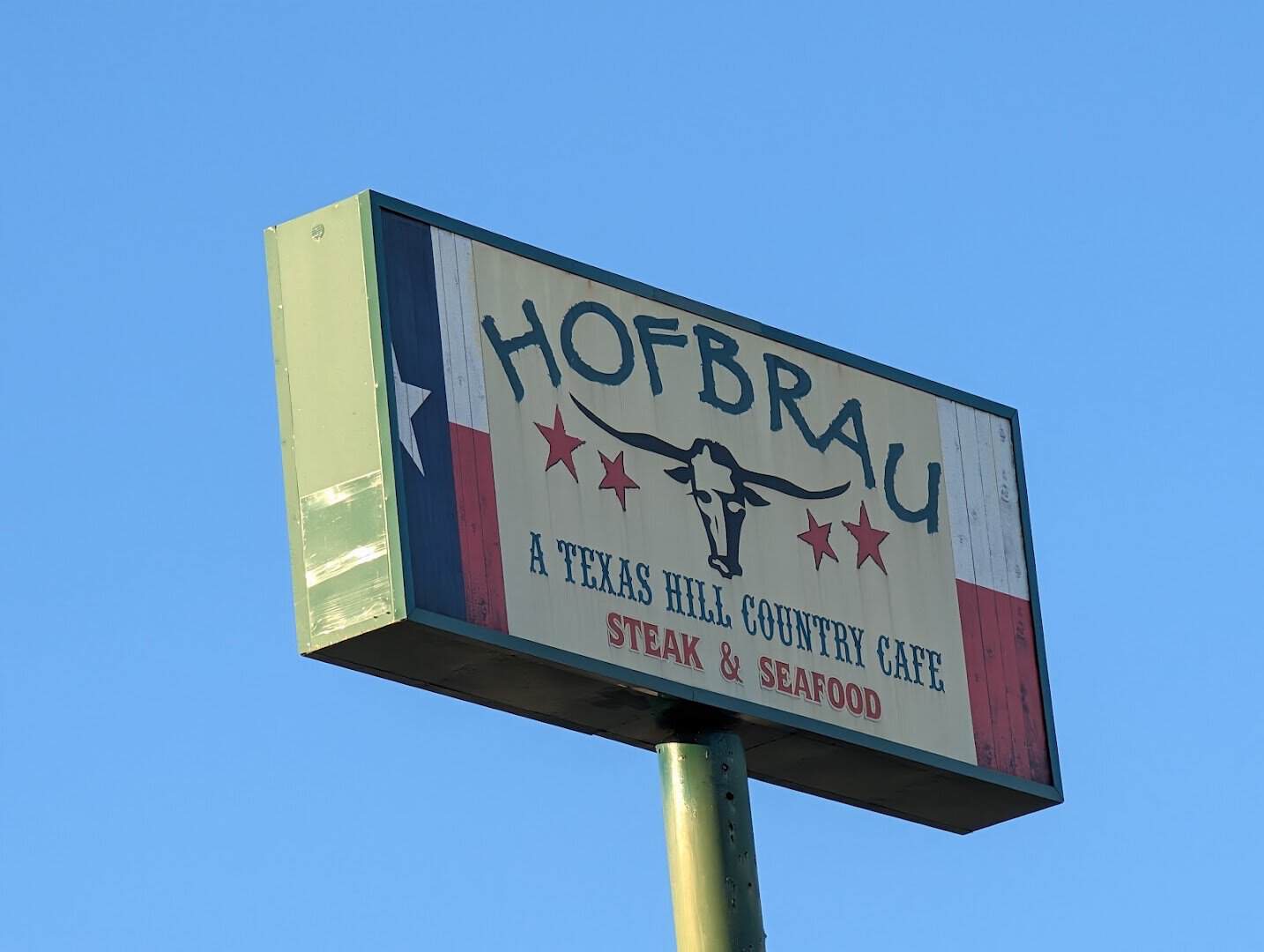Roadside Hofbrau sign on FM 1314 in Porter, Texas