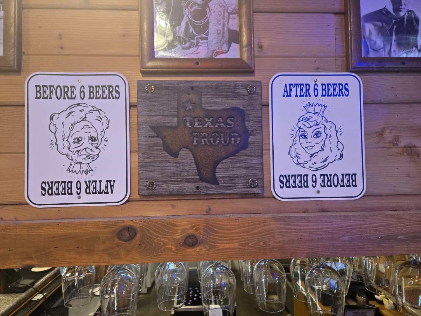 Texas Proud novelty signs on the wall at Hofbrau Steaks in Porter, Texas