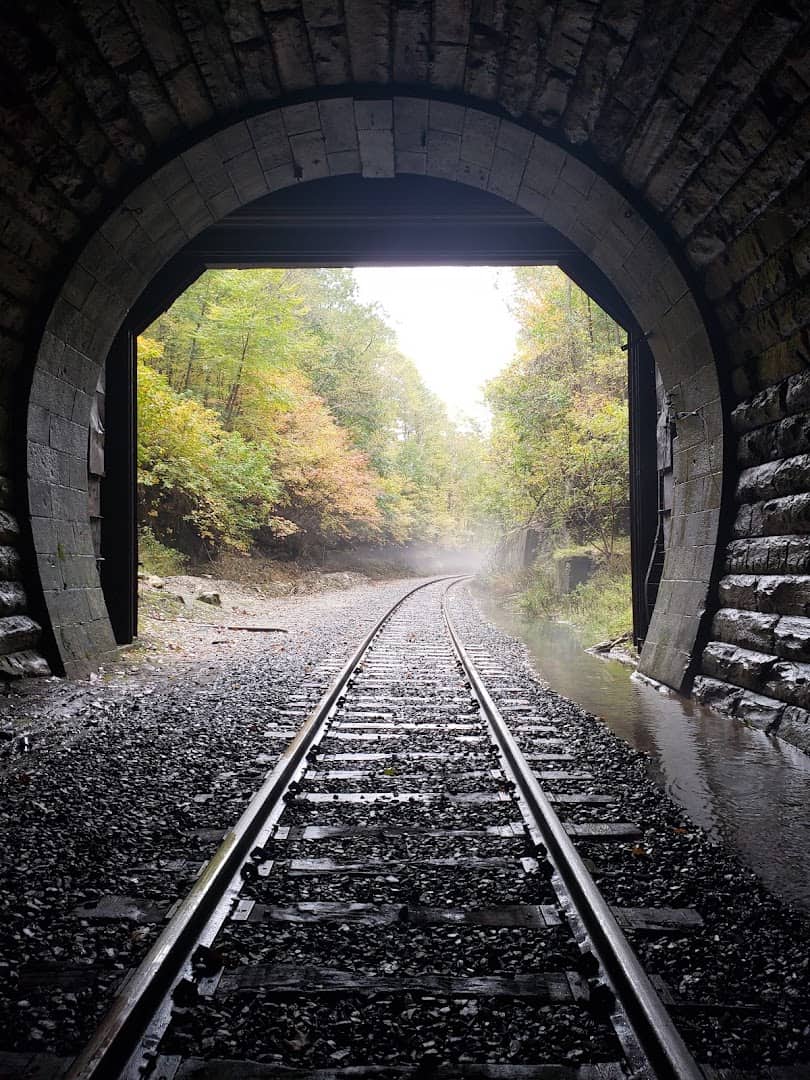 The stone portal of Hoosac Tunnel with rail tracks near North Adams, Massachusetts