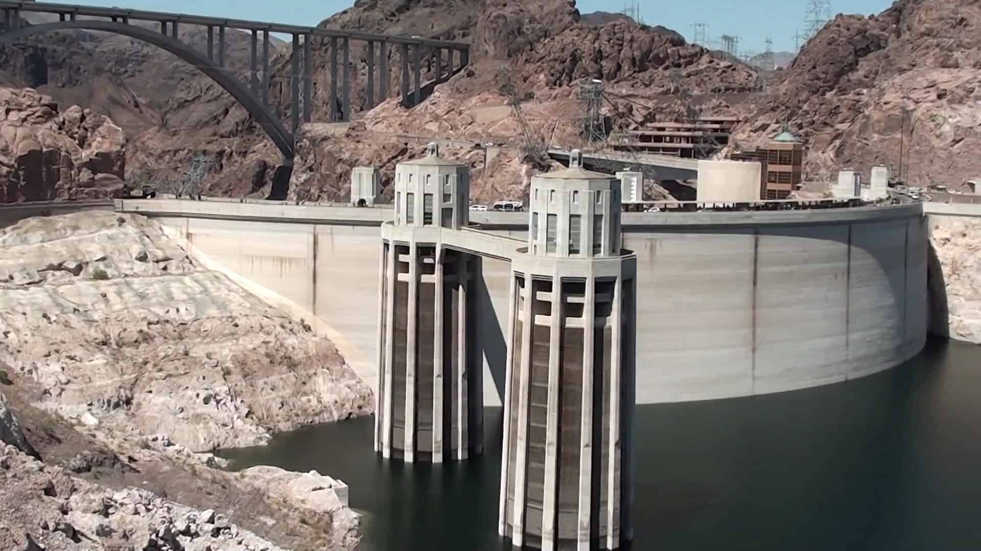 Hoover Dam curving between Mojave Desert cliffs near Boulder City, Nevada