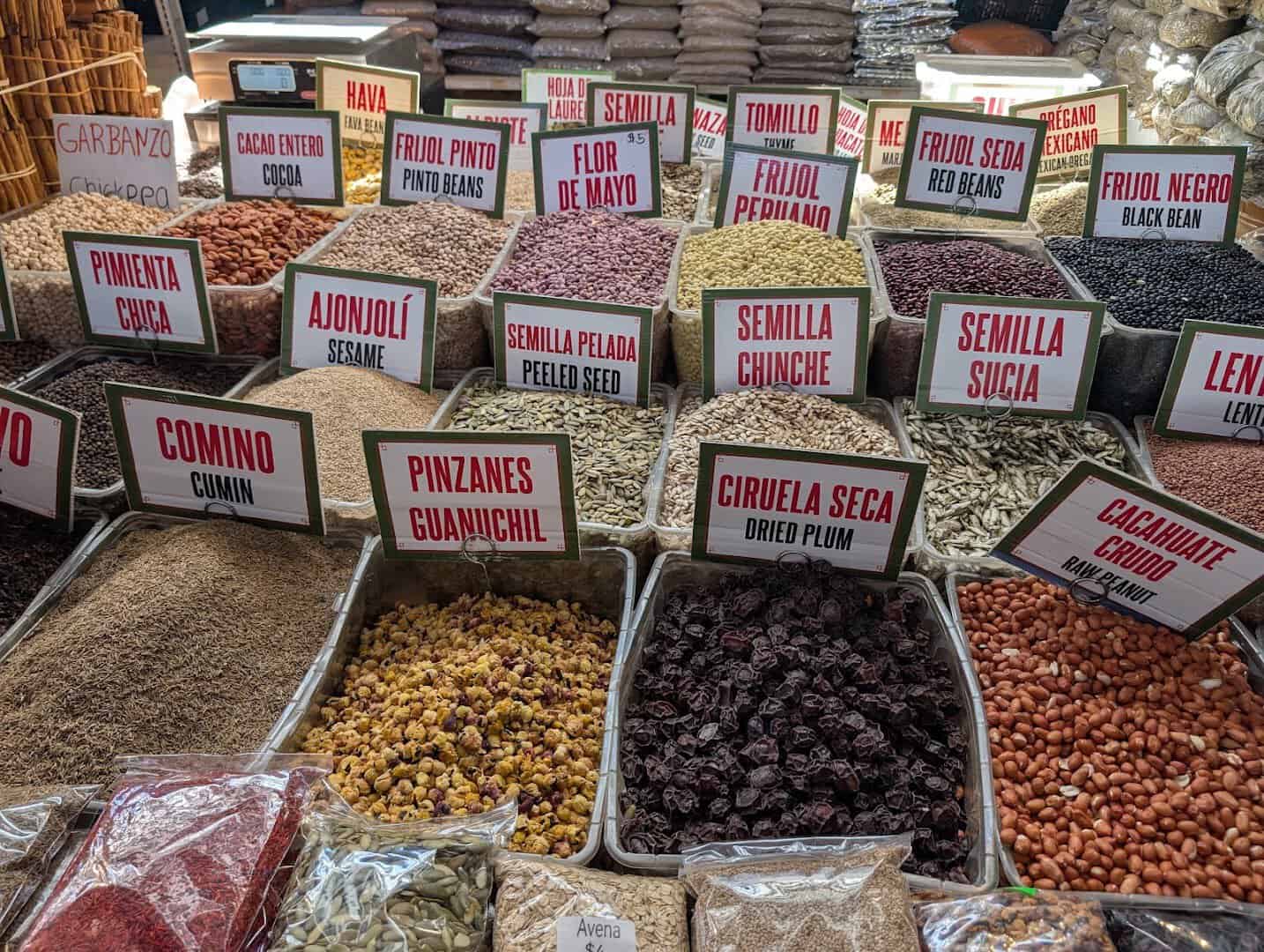 Bins of dried chiles and spices at the Houston Farmers Market in Houston