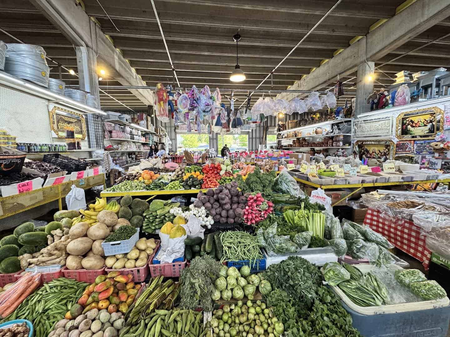 Wide produce hall under the roof at the Houston Farmers Market in Houston