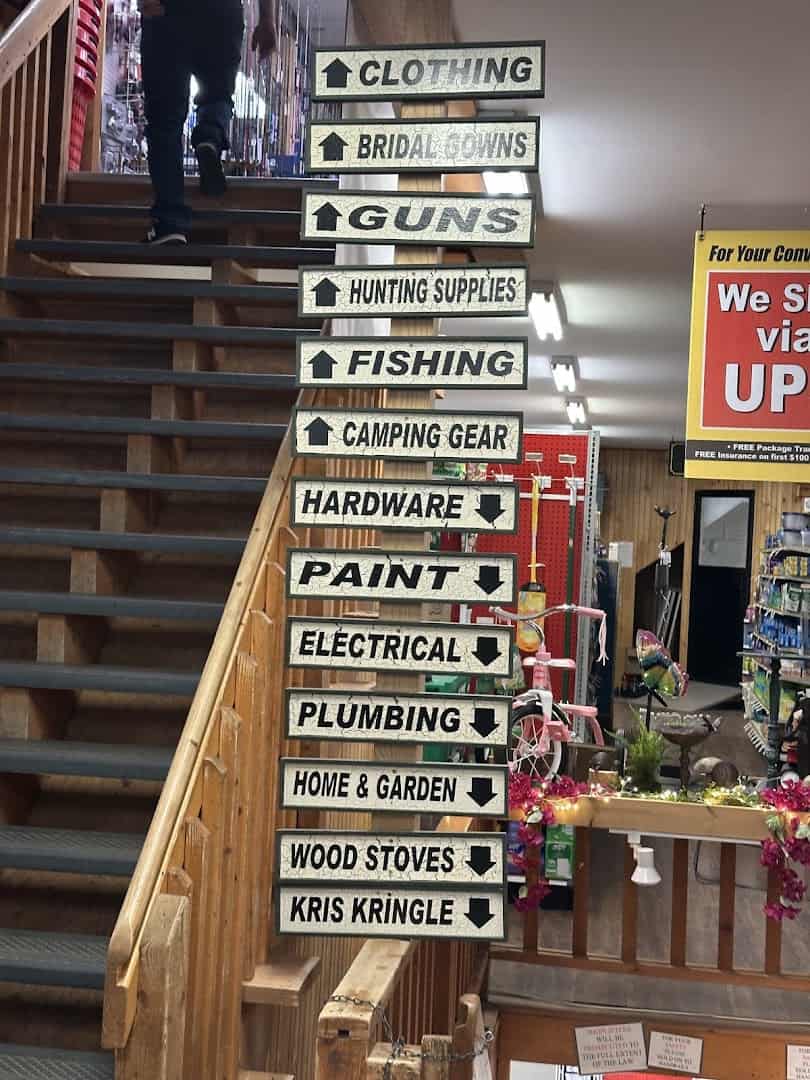 Department arrow signs inside Husseys General Store in Windsor, Maine