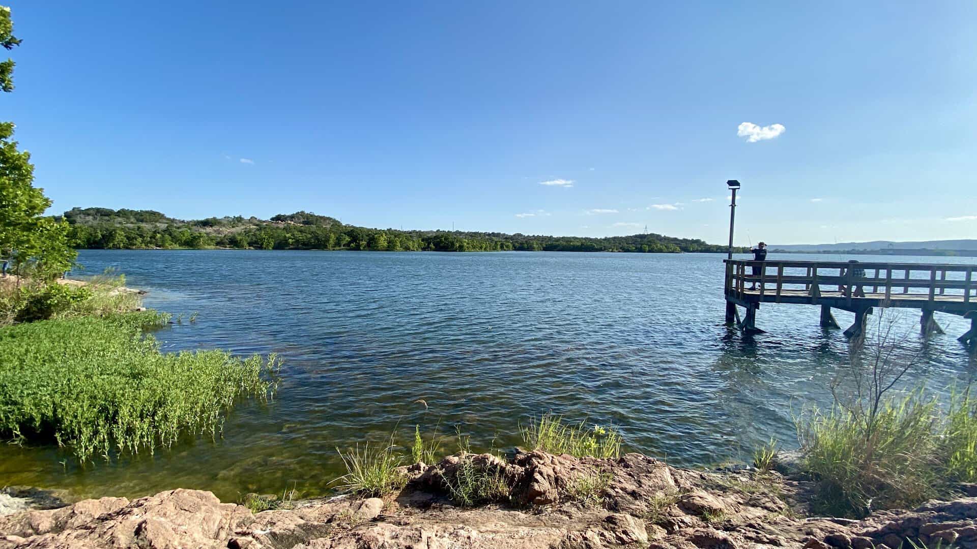Fishing pier over the water at Inks Lake State Park in Burnet, Texas