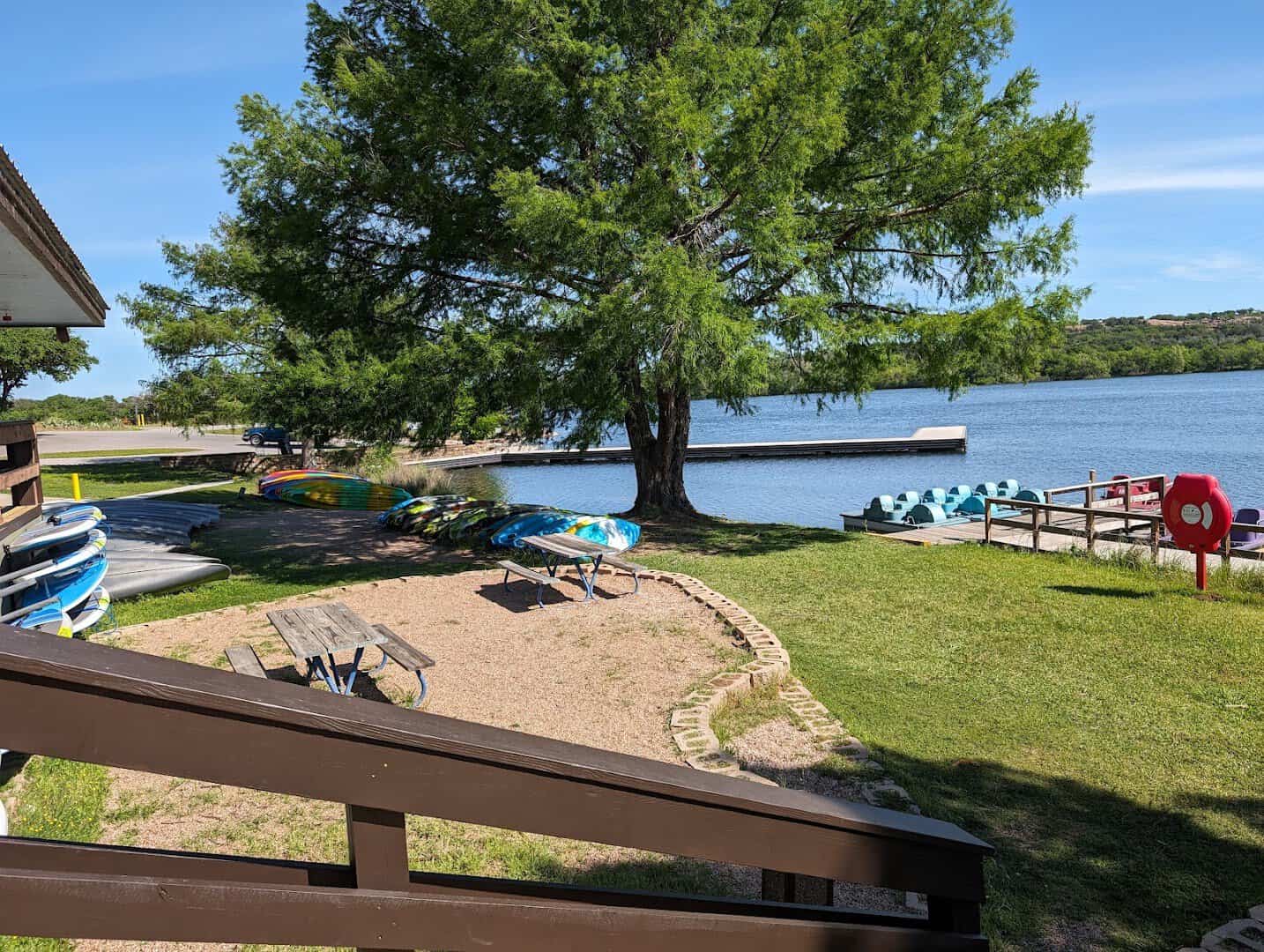 Rental kayaks, canoes and paddle boats by the water at Inks Lake State Park