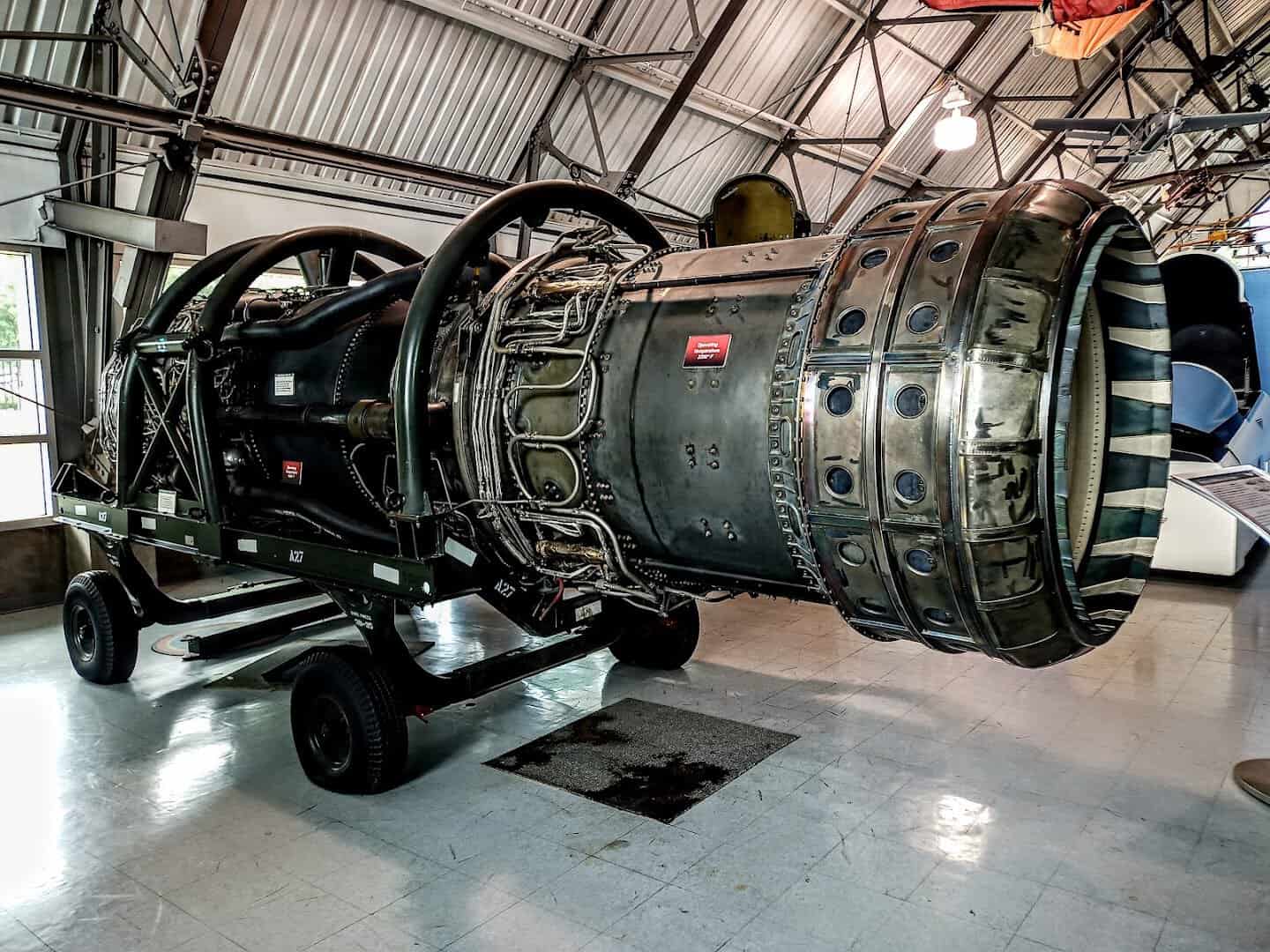 A large jet engine on display at the Frontiers of Flight Museum in Dallas