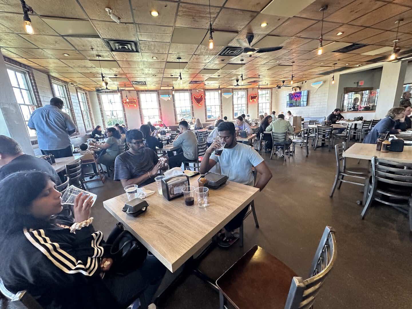 The busy dining room at Killen's Barbecue in Pearland, Texas
