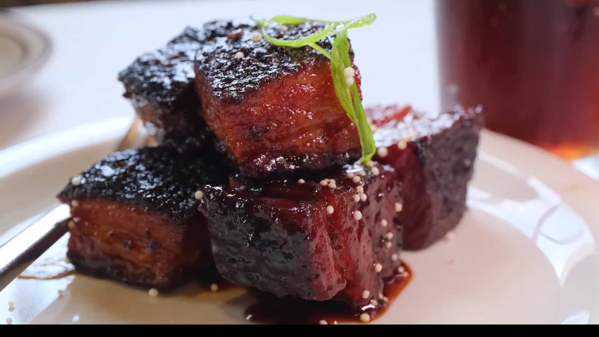 Glazed caramelized smoked pork belly burnt ends at Killen's Barbecue in Pearland, Texas