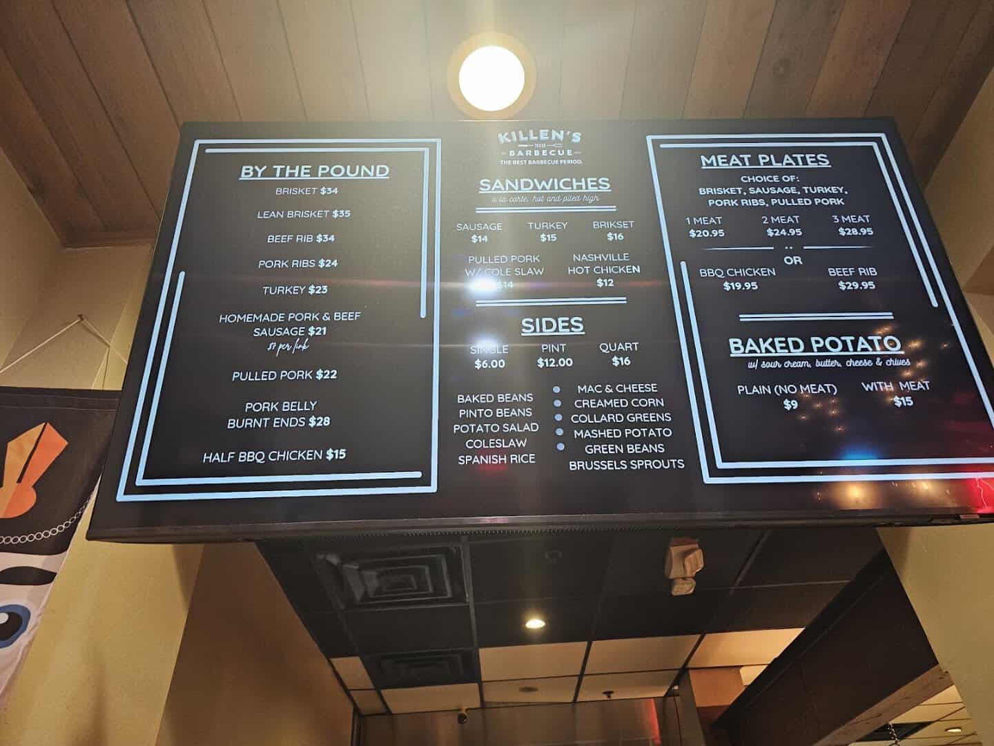 The by-the-pound menu board at Killen's Barbecue in Pearland, Texas