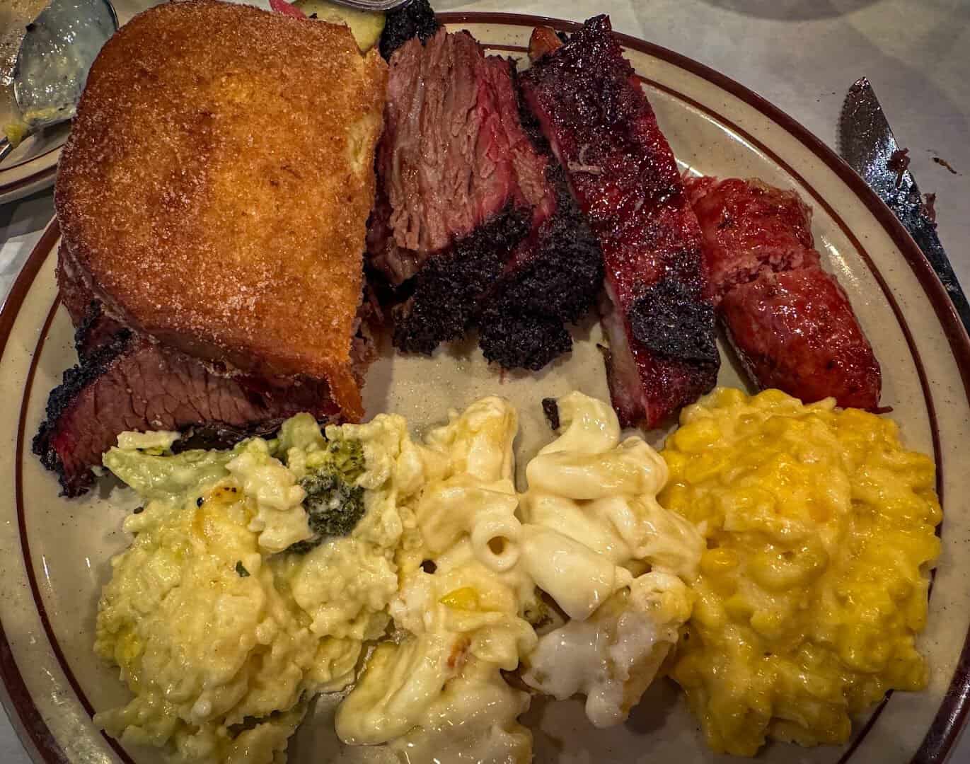 Brisket and pork belly plate with mac and cheese and squash at Killen's Barbecue in Pearland, Texas