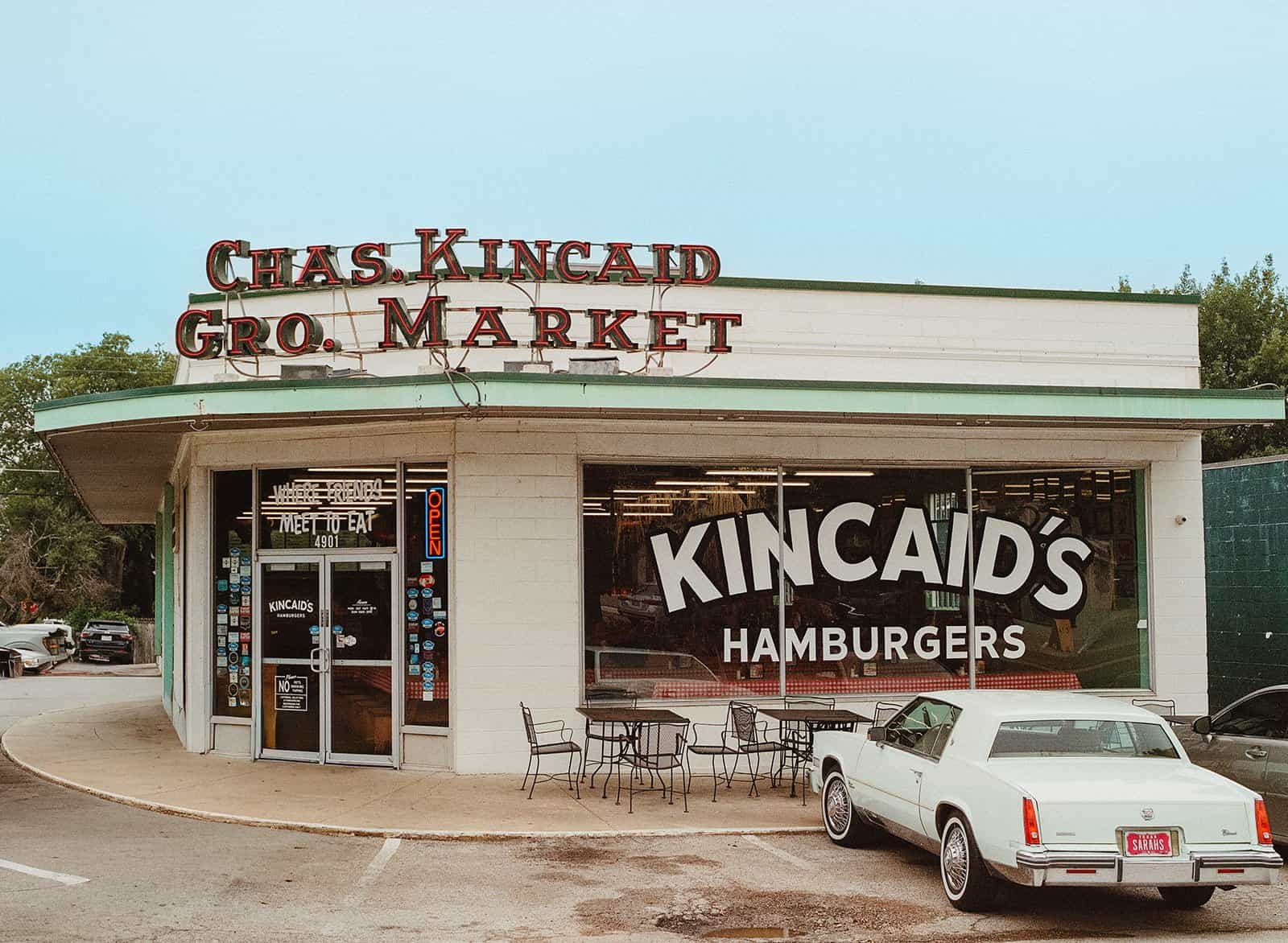 The original Charles Kincaid grocery market storefront and Kincaid's Hamburgers sign in Fort Worth