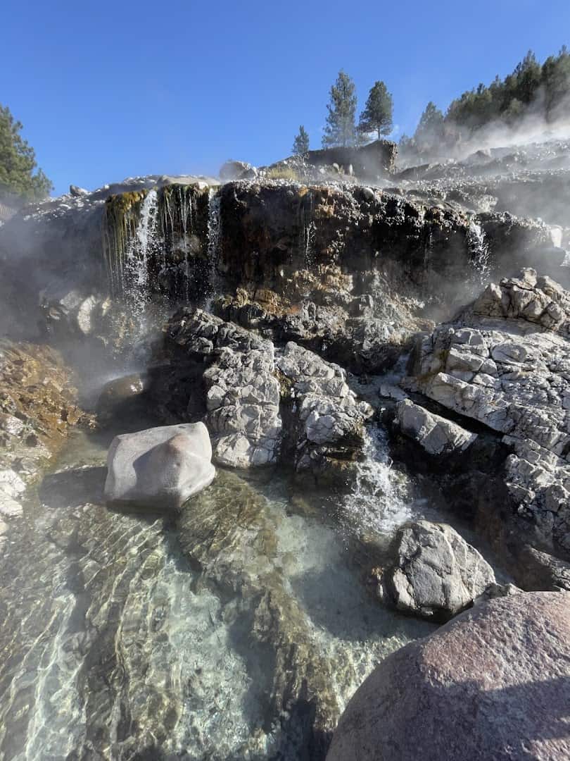 Steaming mineral cascade and soaking pools at Kirkham Hot Springs near Lowman, Idaho