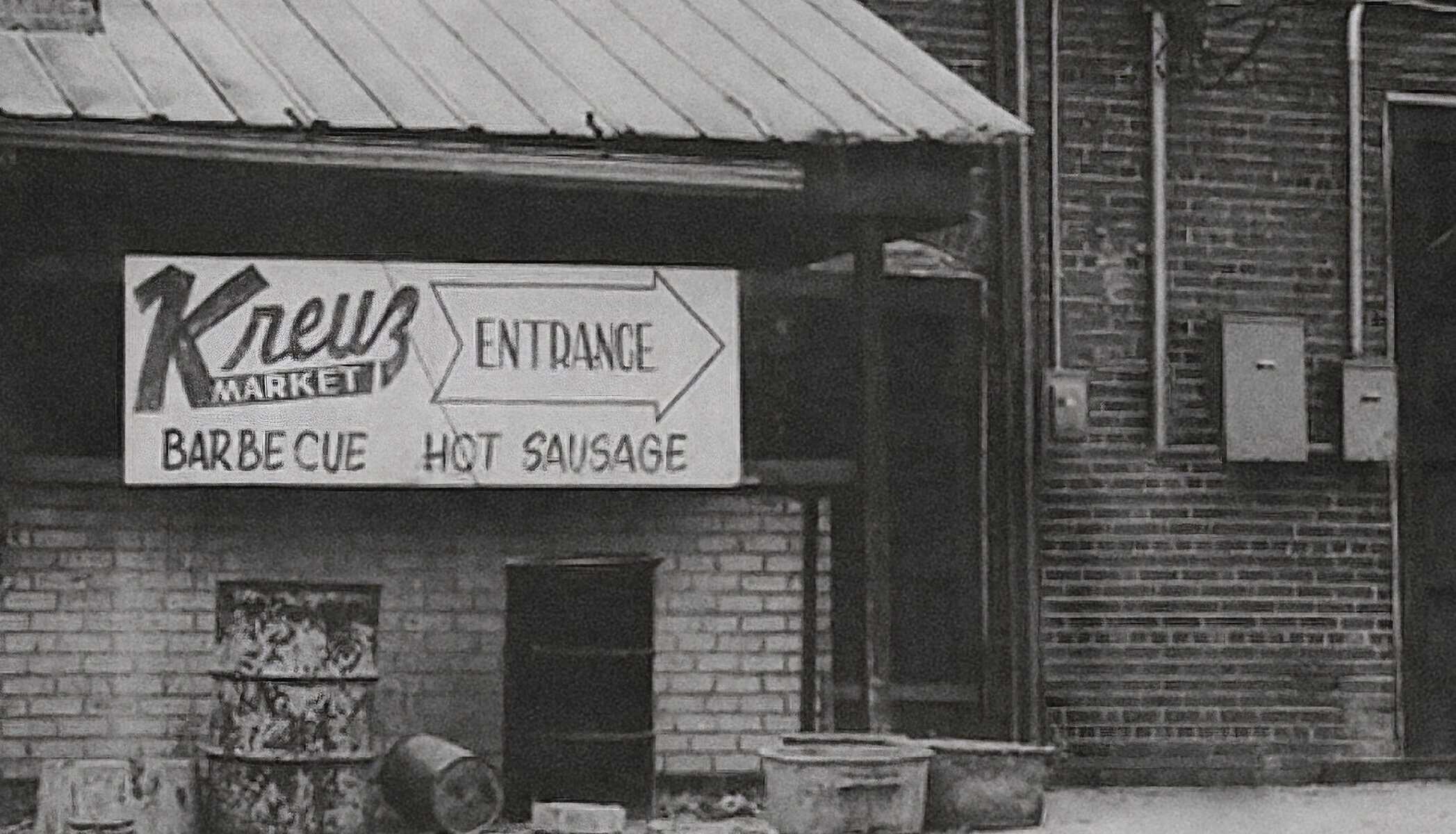 Historic Kreuz Market barbecue and hot sausage building sign in Lockhart, Texas