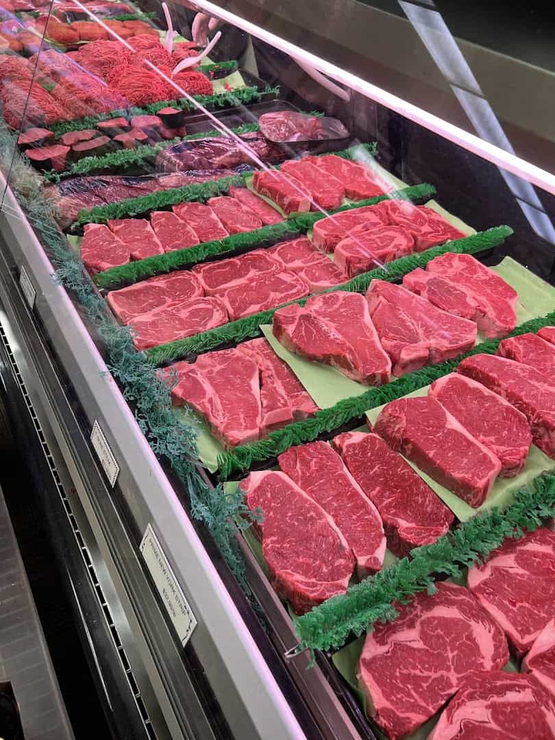 Fresh-cut beef in the meat market case at Kuby's Sausage House in Dallas