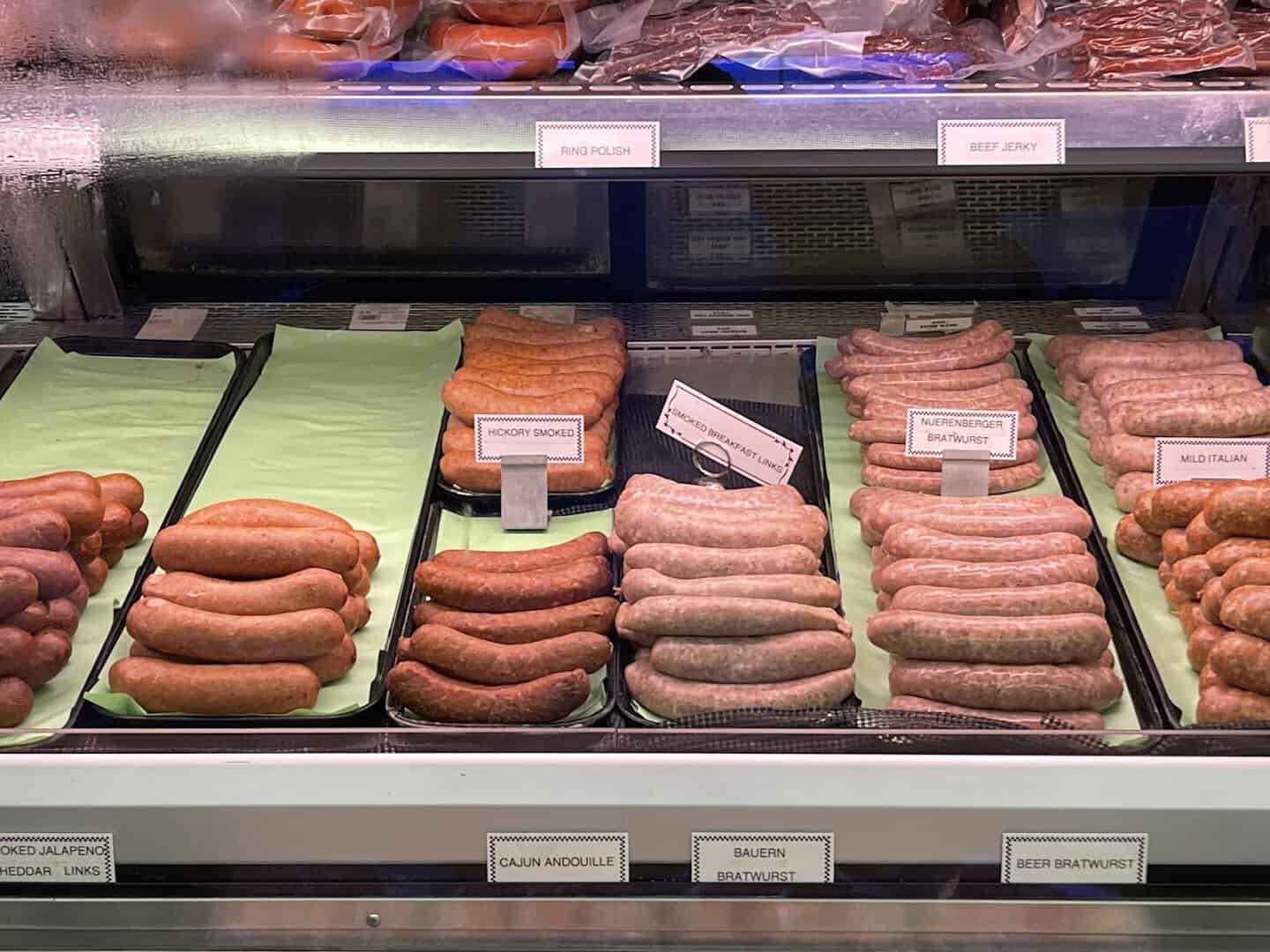 Case of house-made sausages including bratwurst and Polish links at Kuby's in Dallas