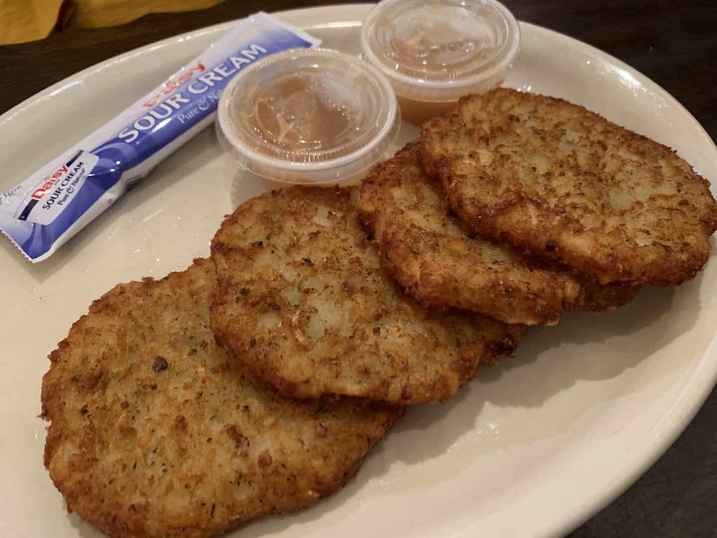 Oma's crispy potato pancakes with applesauce at Kuby's Sausage House in Dallas