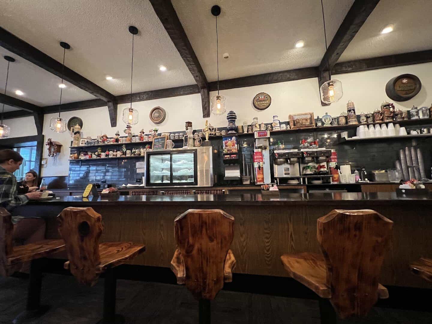 The cozy wood-paneled dining room at Kuby's Sausage House in Dallas