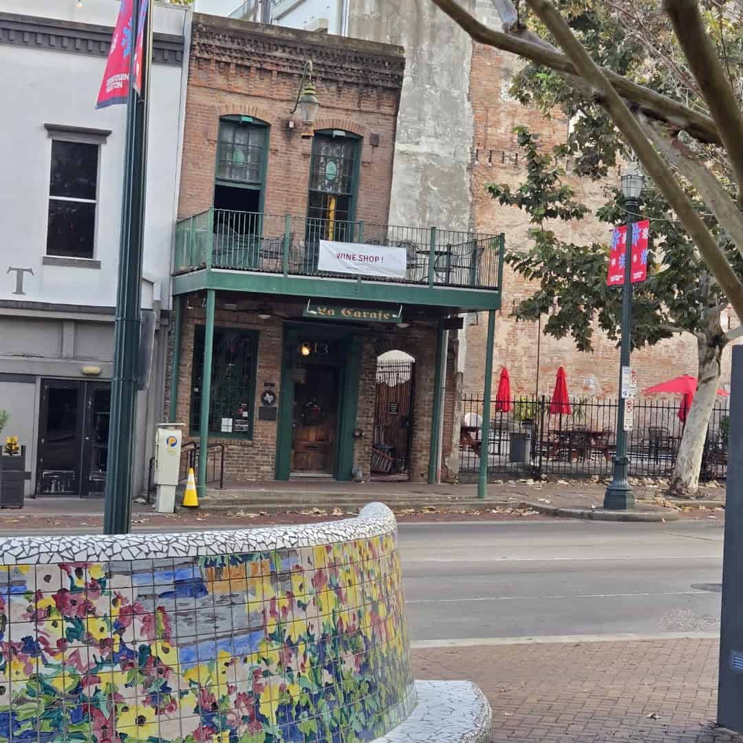 La Carafe historic building seen across the street in Market Square Houston