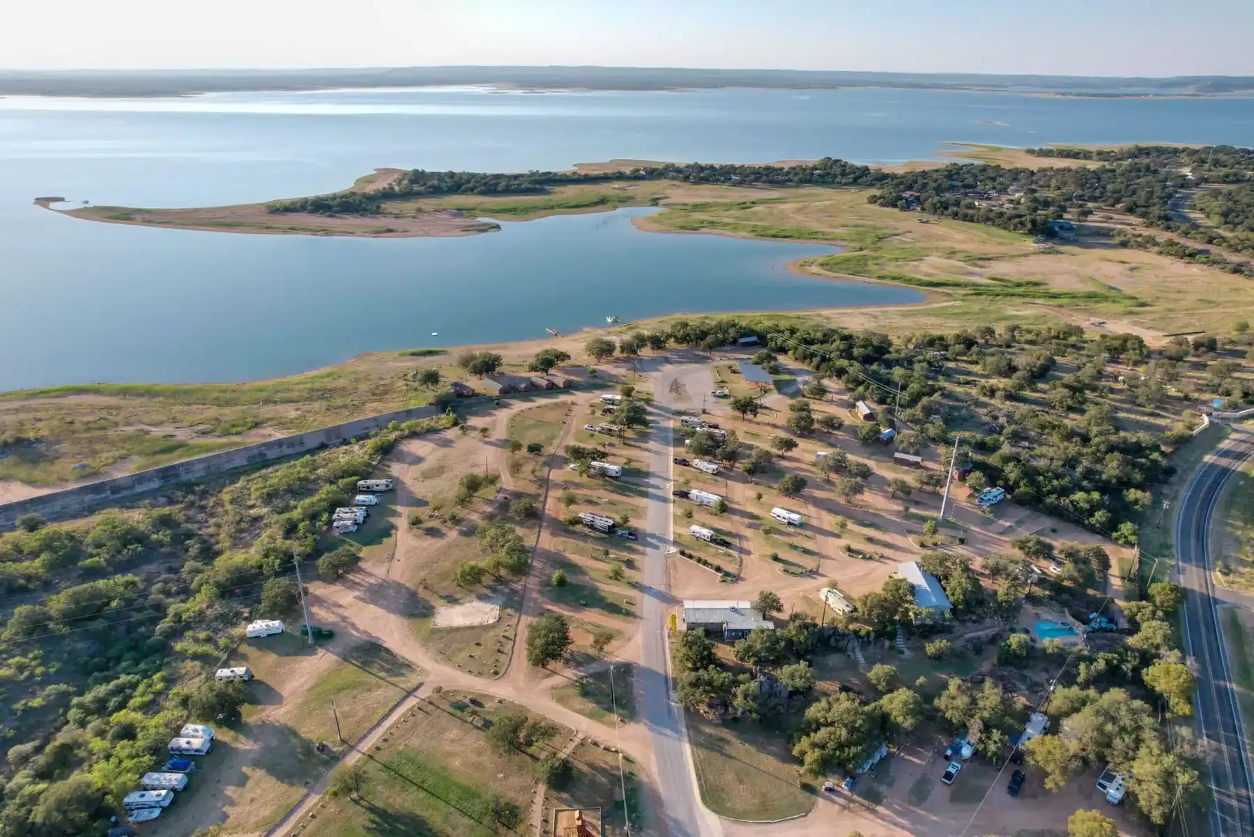 Aerial view of the lakeside resort grounds and Hill Country ranch land at Lake Buchanan near Burnet, Texas