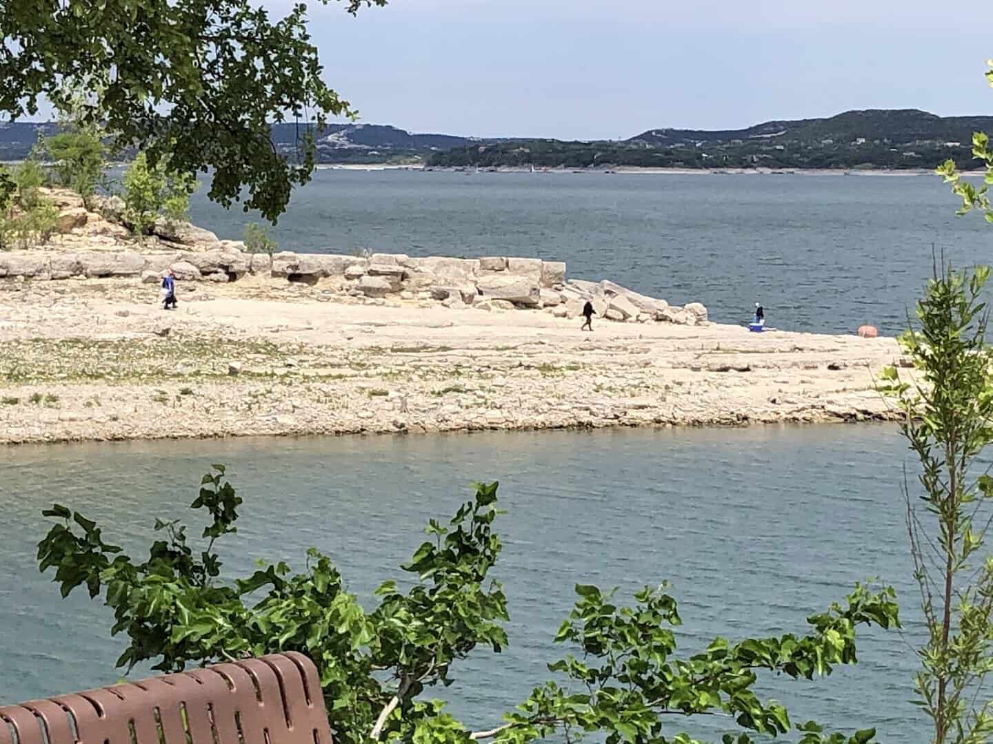 Limestone shore and clear water along a quiet stretch of Lake Travis