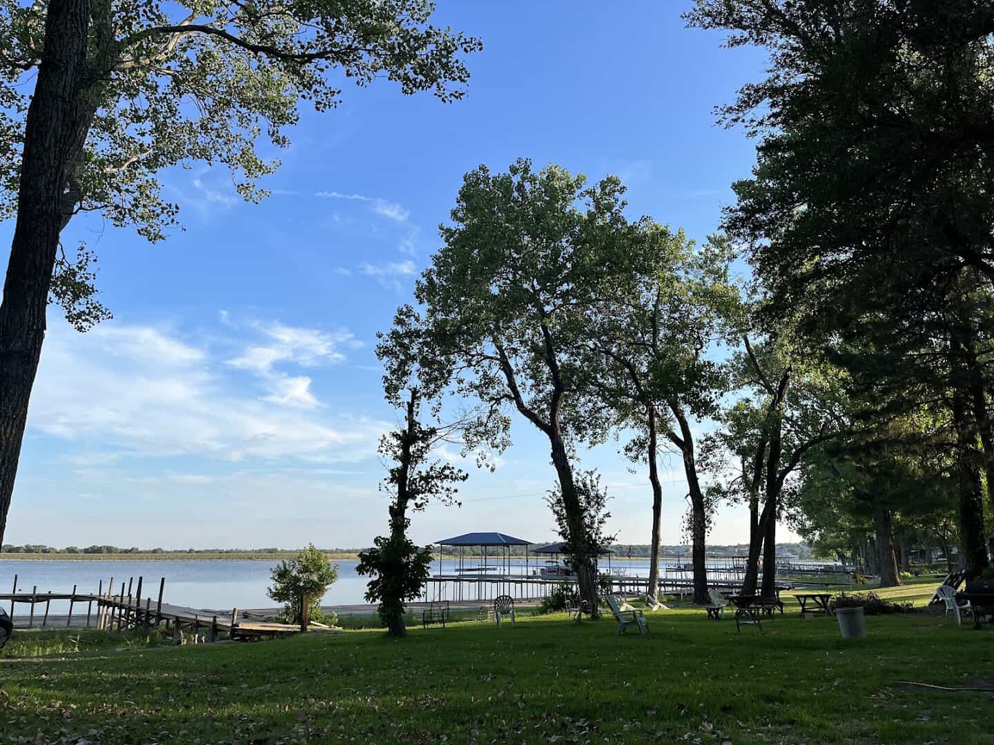 Lake Weatherford framed by trees along the shore in Weatherford, Texas