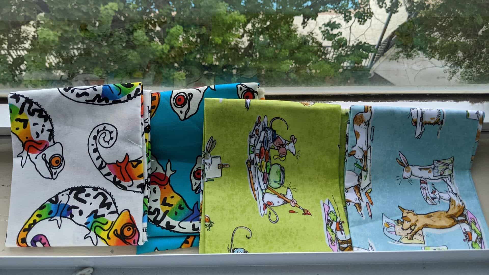Bright folk-print fabrics displayed at Las Colchas in San Antonio